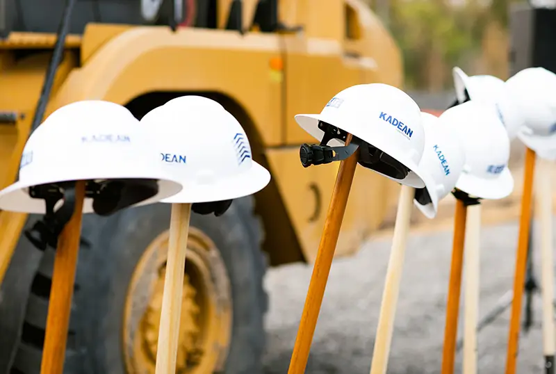 Construction hats at groundbreaking 