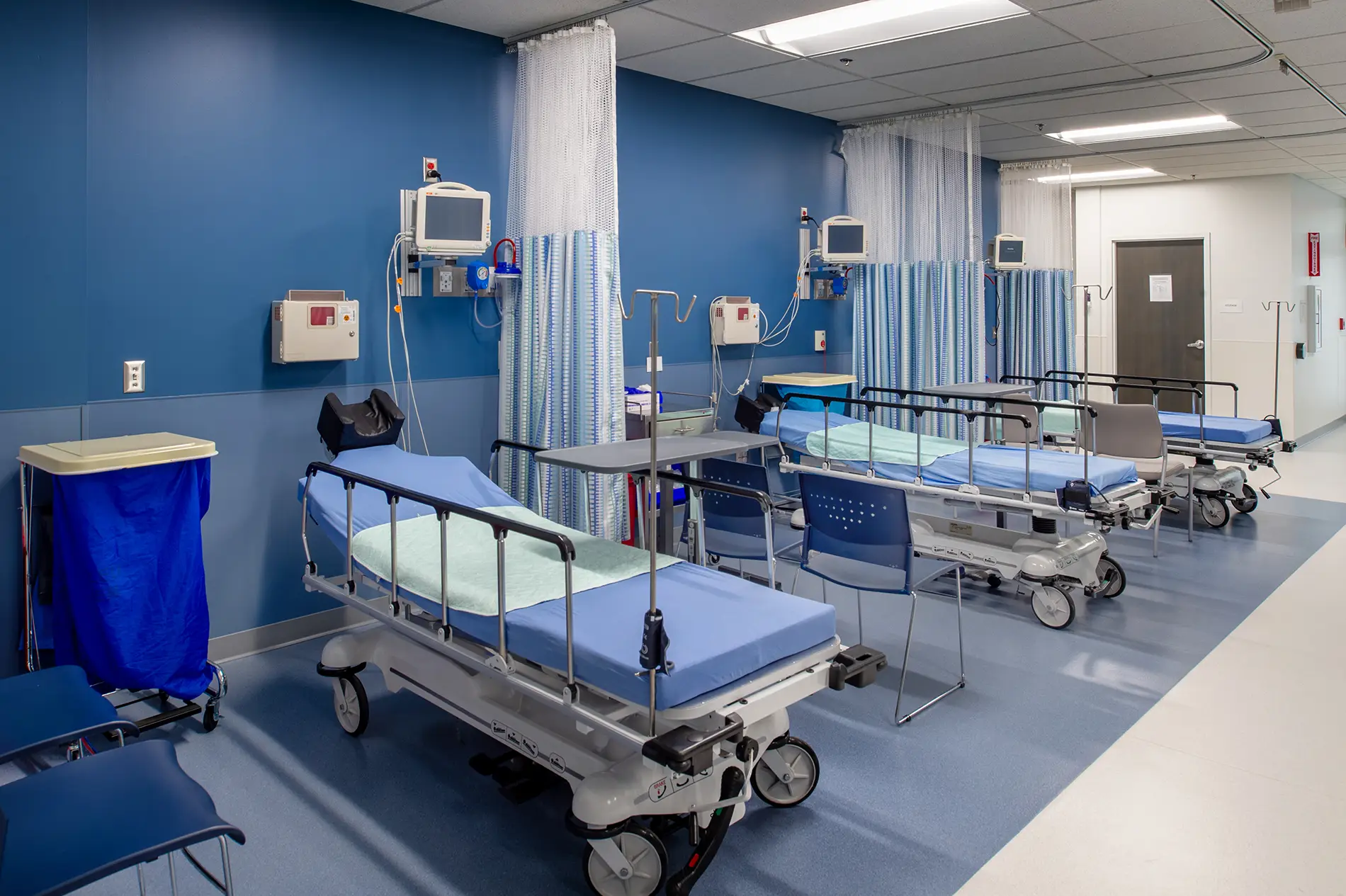 Hospital room with medical beds and equipment