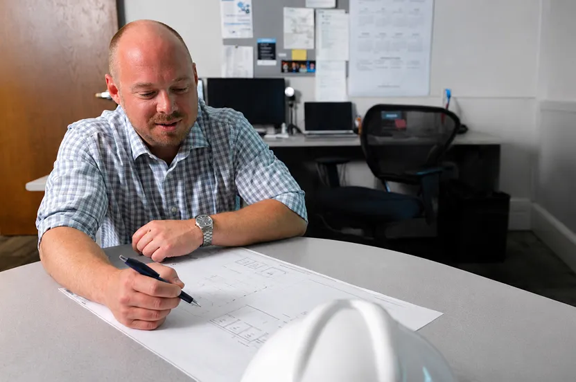 Person with Blueprints